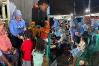 Ndaru dan Repnas saat membagikan makanan dan susu gratis