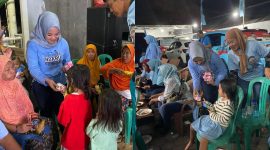 Ndaru dan Repnas saat membagikan makanan dan susu gratis