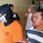 SA saat digelandang polisi ke Mapolres Serang. (FOTO BBC).