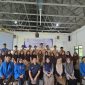 Mahasiswa Unpam saat foto bersama dengan dewan guru dan pelajar MA Darul Irfan usai sosialisasi mengenai bahaya Bullying. (Istimewa)
