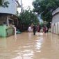 Sungai Cisadane meluap mengakibatkan banjir di Desa Tanjung Burung, Kabupaten Tangerang (Istimewa)